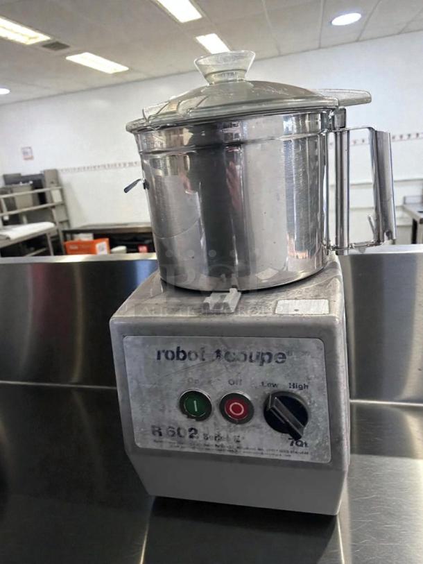 Robot Coupe R602 stainless steel food processor, UL & NSF listed. Premium condition, tested and operational. Model RC-L-FP-0399.