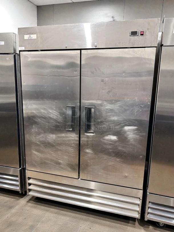 Commercial Refrigeration Equipment double door reach-in refrigerator in stainless steel, premium condition, UL listed, model COM-L-RFE-0376.