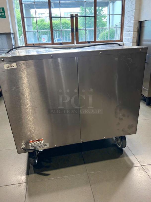 Stainless steel Wittco commercial double drawer warmer, model WIT-L-DRW-0390, UL listed, tested, on casters.