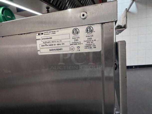 Stainless steel Carter-Hoffmann heated holding cabinet, model KFCVOBH208, shown with UL/NSF labels; excellent condition.