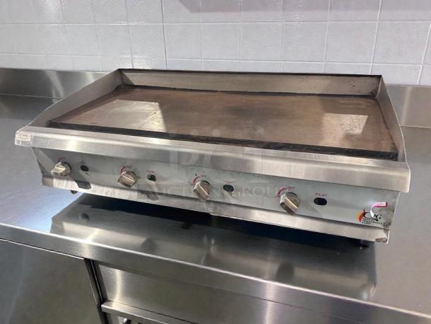 Superior Condition Cooking Performance Group stainless steel commercial gas countertop griddle, model CPG-L-GRD-0405, fully tested and operational.