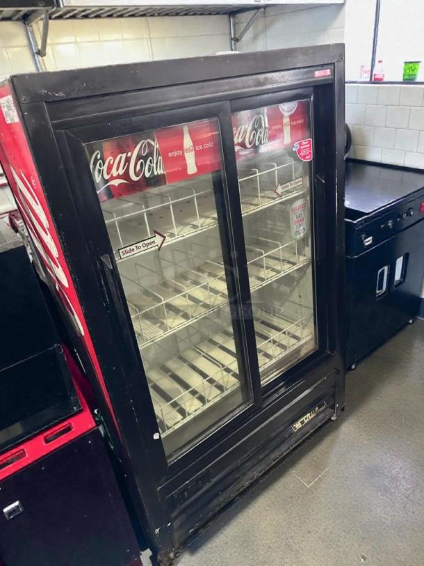Coca-Cola branded True GDM-33SL-54EM-LD commercial glass door refrigerator, 54 inches, UL listed, premium condition.