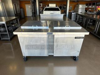 Continental Refrigerator SW60-24M, 60" stainless steel refrigerated worktop in excellent condition, on casters, fully tested.