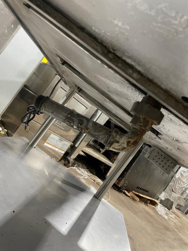 Vulcan commercial stainless steel griddle with natural gas power, thermostatic control, back and side splash, on caster stand.