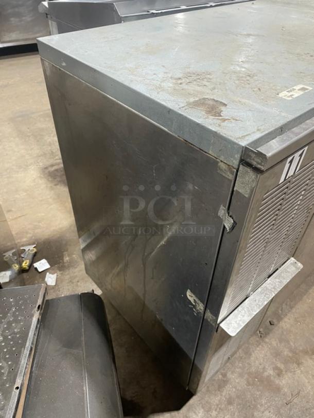 Perlick stainless steel 4-door undercounter refrigerated cabinet, solid doors, coated wire rack, SN: 518921, 115V, 1 phase, used condition.