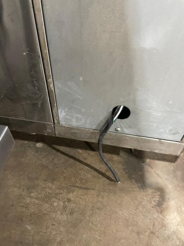 Perlick 4-Door Stainless Steel Undercounter Refrigerated Cabinet, SN: 518921, with coated wire rack, 115V, used condition.