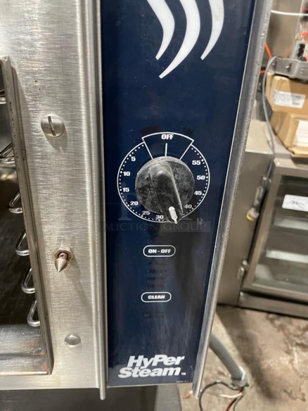 Groen HyPer-Steam Series dual compartment 6-pan convection steamer, model HY-6E. Features individual controls and built-in pan rack.