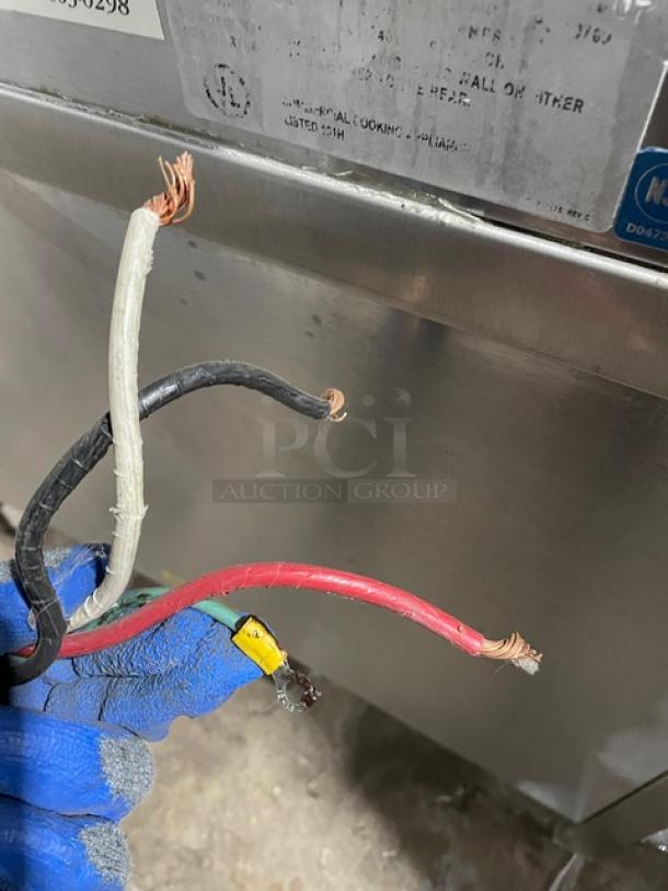 Groen HyPer-Steam HY6E commercial stainless steel steamer, dual compartments, with exposed wiring, universal pan rack, and individual controls.