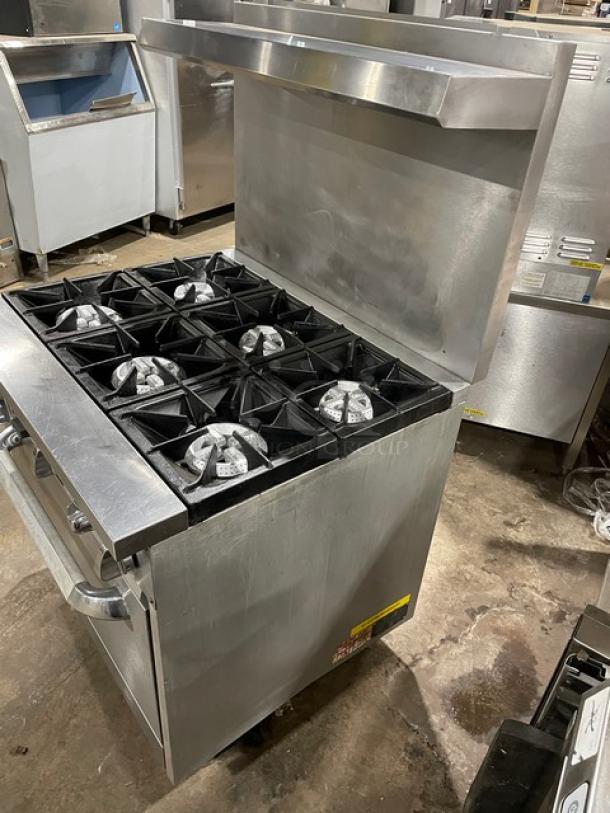 Qualite stainless steel 6-burner gas range/oven combo with backsplash, overhead salamander shelf, and wired oven rack. Model QLGR36NG.