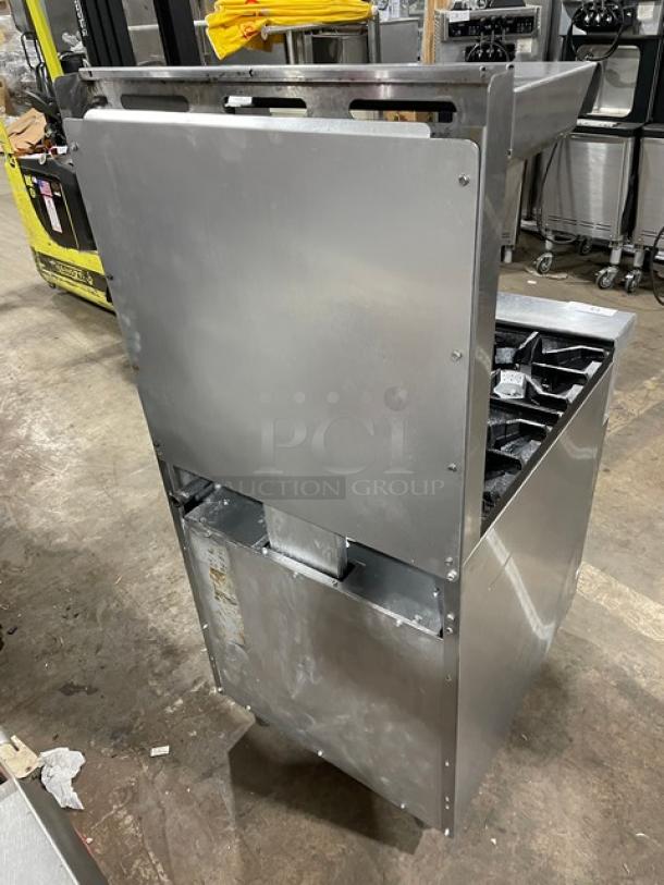 American Range commercial stainless steel 4-burner gas range/oven combo with backsplash, overhead salamander shelf, and wired rack.