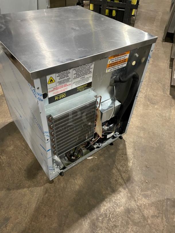 Delfield 406PSTAR2 stainless steel undercounter single door refrigerator, 27" worktop, coated wired rack, on casters, 115V 1 phase.