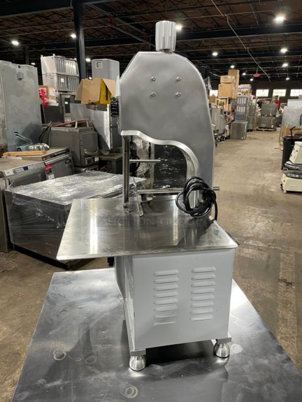 Universal HLS1650A electric bone saw, polished anodized aluminum, heavy-duty, countertop model on legs, 110V, 1 phase.