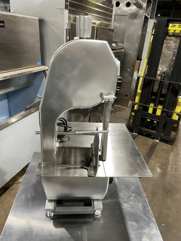 Universal HLS1650A electric bone saw, polished anodized aluminum, heavy duty, 110V, countertop, on legs, SN: 25HL7209-121.