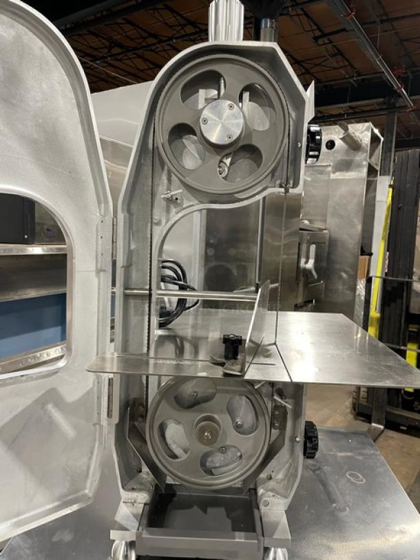 Universal HLS-1650A electric bone saw, commercial-grade, polished anodized aluminum, countertop model on legs, 110V, 1-phase.