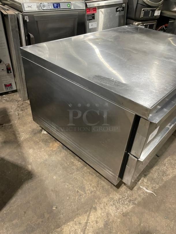 Continental stainless steel 2-drawer refrigerated chef base on casters; commercial-grade, excellent condition.