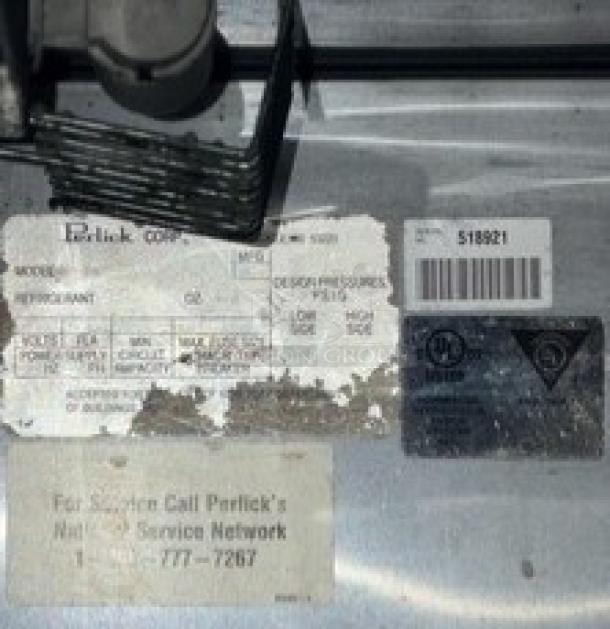 Perlick Commercial 4-Door Stainless Steel Undercounter Refrigerated Cabinet, SN: 518921, with coated wired rack, 115V, 1 Phase.