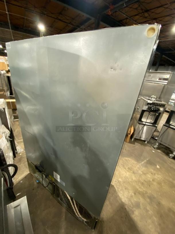 Imbera VRD43 commercial refrigerator back view, Energy Star certified, 115V, with poly coated wired rack, minor wear visible.