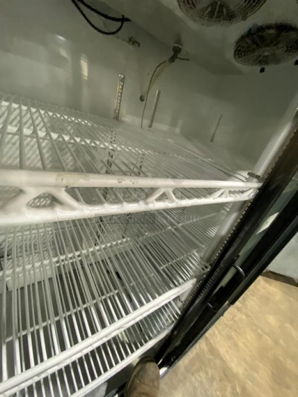 Leader Commercial Double Swing Door Merchandiser Refrigerator, model LS48SC, with poly-coated wired racks, 115V 1 Phase.