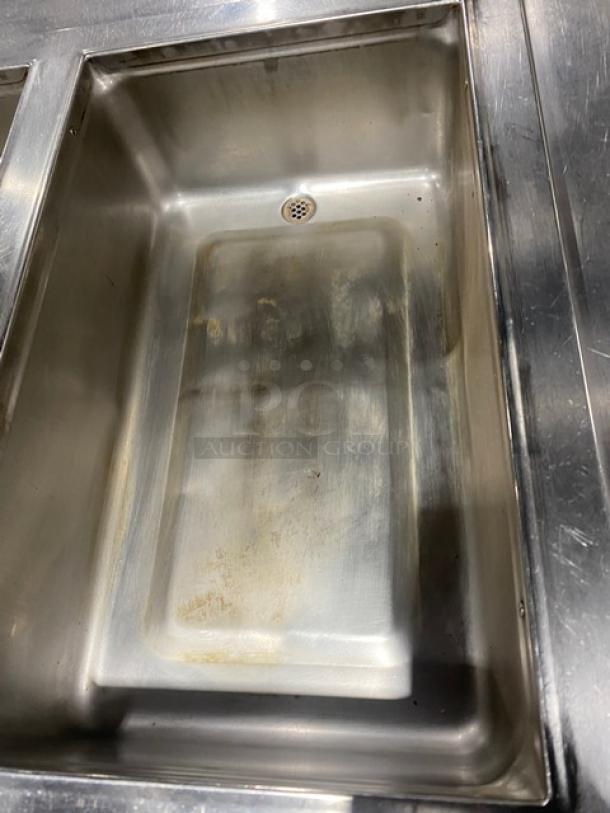 Wells MOD300TDM stainless steel 3-well hot food table, electric with thermostatic controls, single undershelf, 208/240V, on legs.