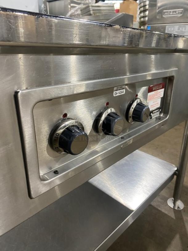 Wells MOD300TDM 3-well stainless steel steam table, thermostatic controls, single undershelf, 208/240V, on legs, excellent condition.