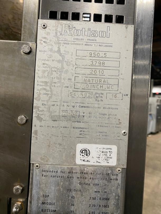 Rotisol 950.5 stainless steel rotisserie oven, model 9505, serial number 3798. Features tempered glass doors.