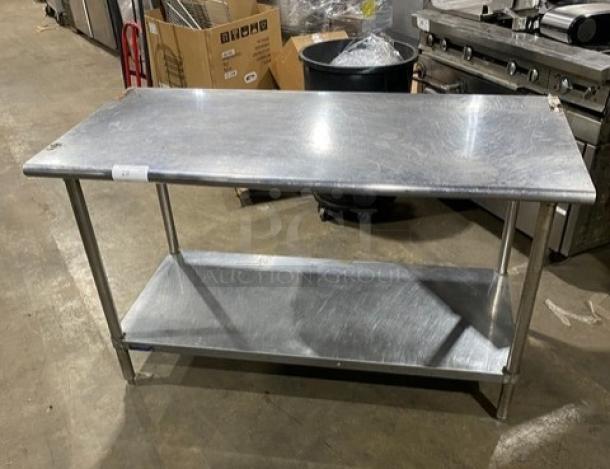 Sapphire commercial stainless steel worktop table with undershelf. Features durable construction on sturdy legs.