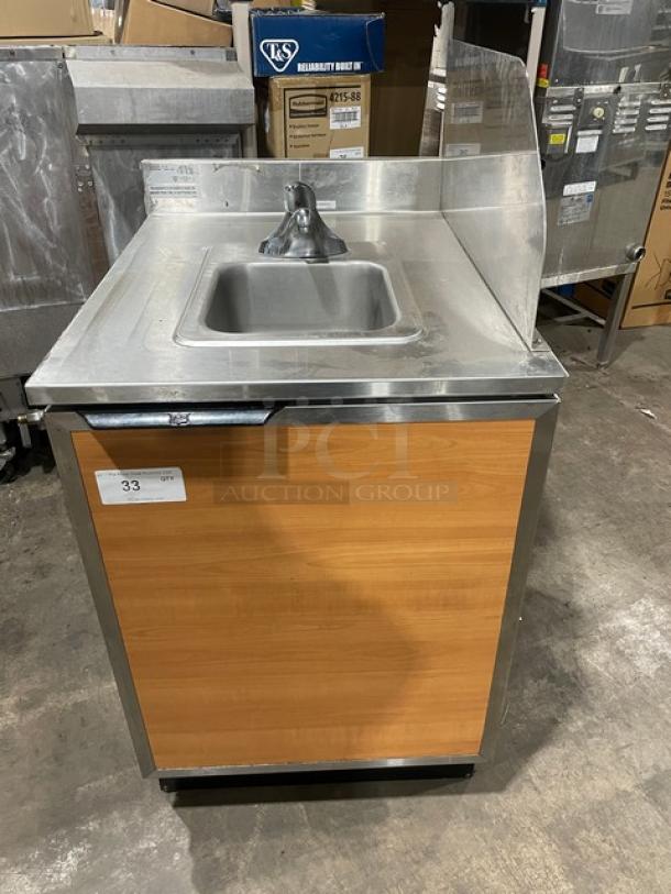 Duke SUB-PS-24-CM stainless steel hand washing cabinet with back and right-side splash, single compartment, wood panel front.