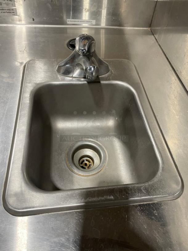 Duke stainless steel hand washing cabinet, model SUB-PS-24-CM, with back and right-side splash. Good condition.