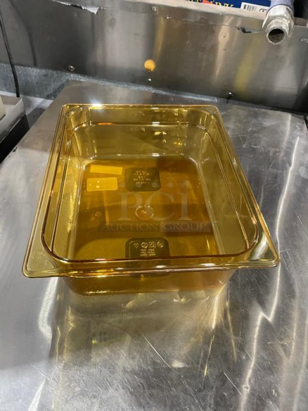 Rubbermaid Commercial Amber High Heat 1/2-Size 4" Food Pan, Model FG224P00AMBR, new condition with visible markings.