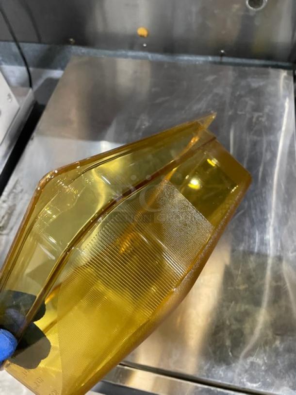 Rubbermaid Commercial Amber High Heat 1/2-Size 4" Deep Food Pan, Model FG224P00AMBR, new condition, amber color.