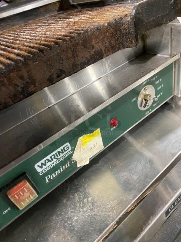 Waring Commercial WPG250 Panini Press Grill, stainless steel, electric, visible wear, 120V, adjustable temperature dial.