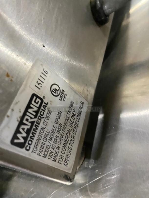 Waring Commercial Stainless Steel Panini Press Grill, Model WPG250, 120V. Serial Number 151116. UL listed label visible.
