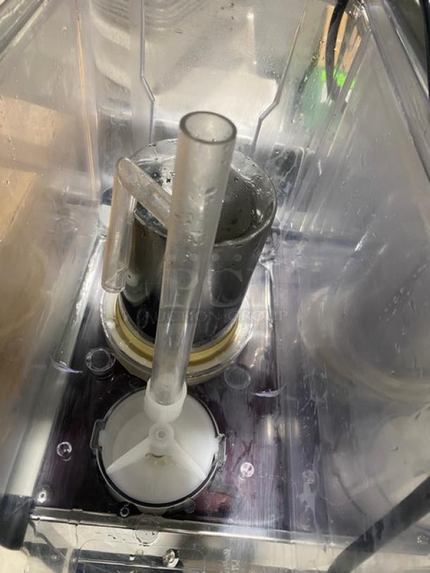 Coldline Royal-2P stainless steel beverage dispenser interior with polycarbonate hoppers and drip tray, used condition.