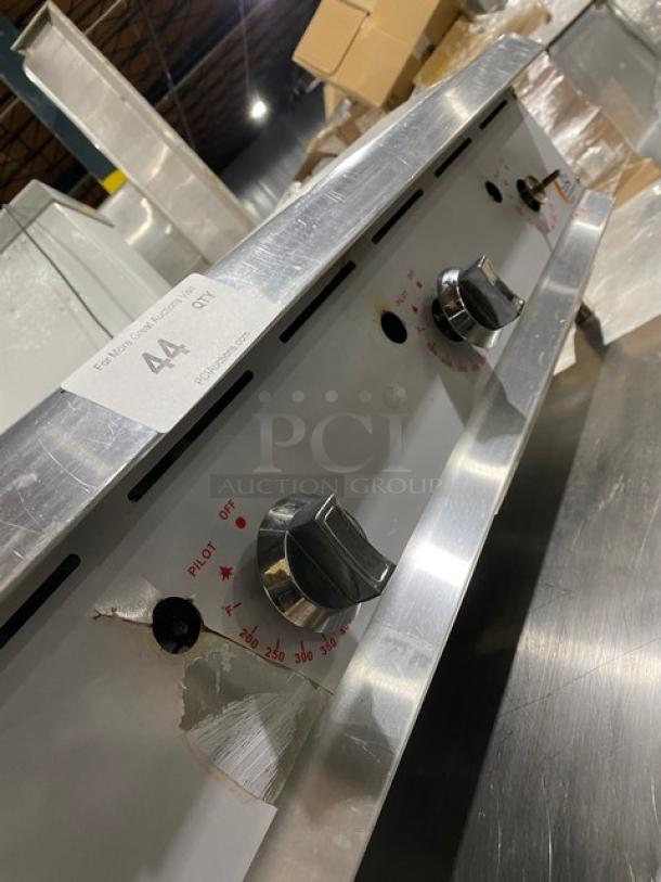 CPG stainless steel gas griddle with thermostatic controls, back and side splash, on legs, visible dials, and model sticker.