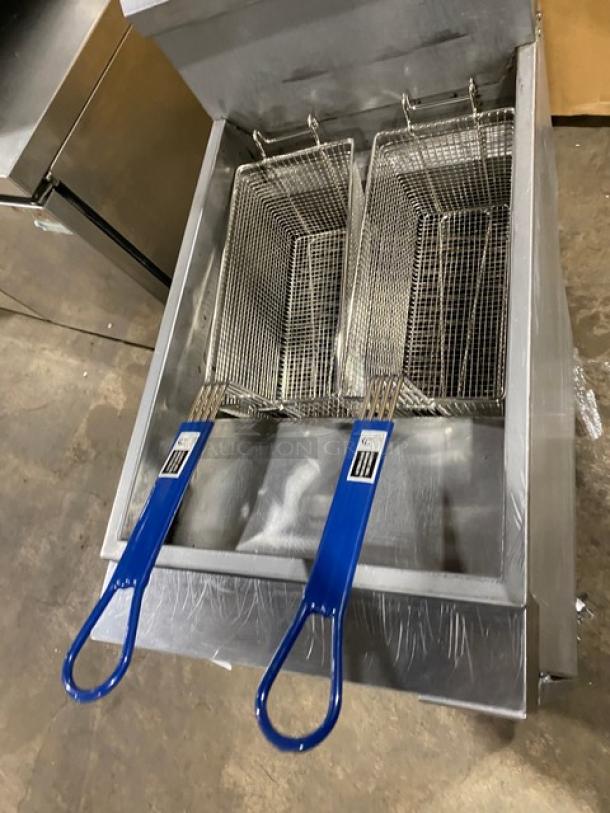 Vulcan LG400 commercial stainless steel gas fryer with backsplash, basket hanger, and fry baskets, on casters.