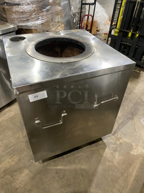 Commercial stainless steel tandoor oven, natural gas powered, on casters, excellent condition, labeled as item 49.