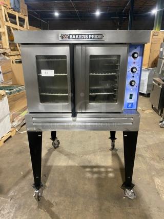 Bakers Pride Cyclone Series stainless steel gas convection oven, single stack, with wired rack, on casters, good condition.