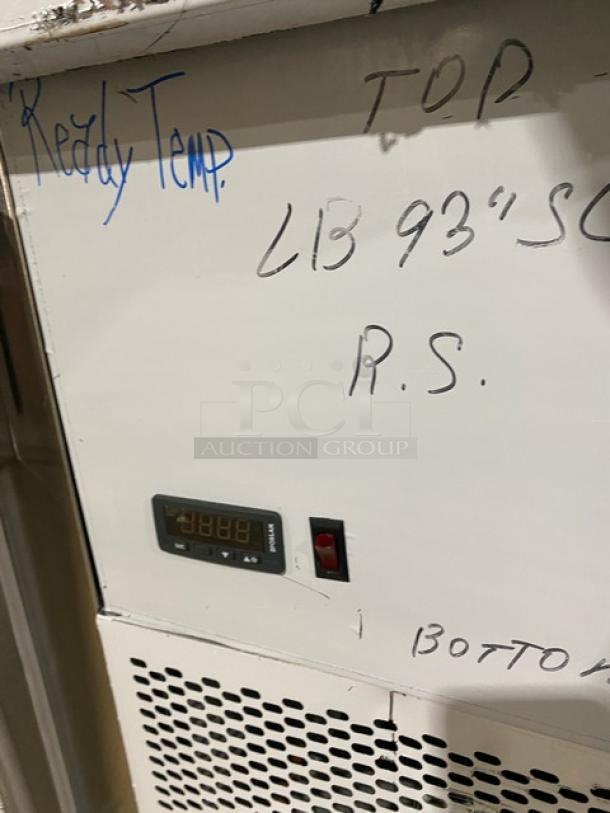 Custom Cool stainless steel refrigerated worktop table, model LB93, featuring a digital temperature display, labels, and caster wheels.