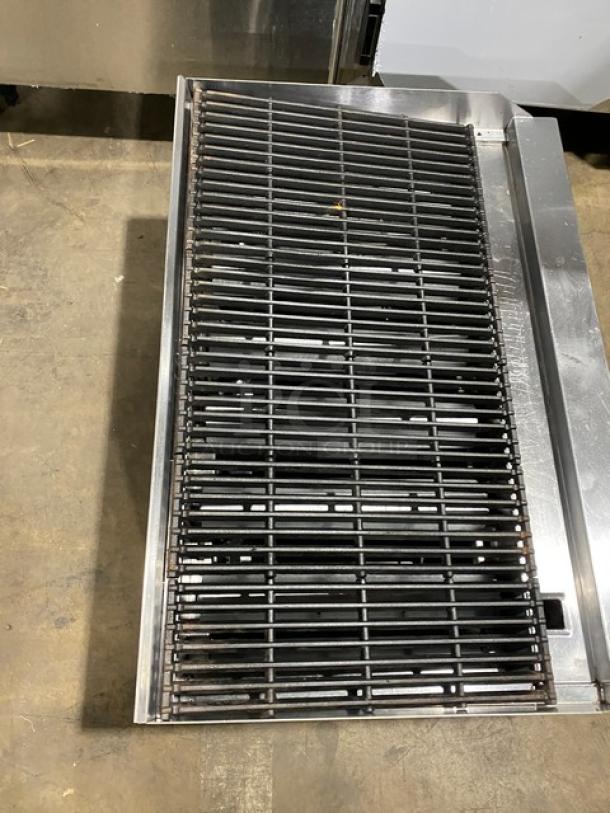 Cookline 60" stainless steel gas char broiler with legs. Heavy duty radiant design, used condition. Ideal for commercial use.