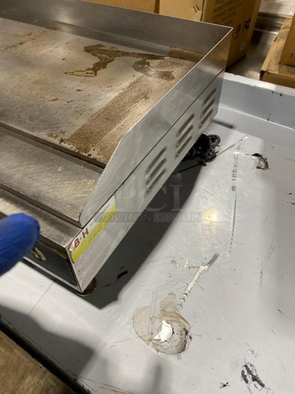 Cecilware EL1636 36" stainless steel electric griddle with thermostatic control, back and side splash, on legs, visible wear.