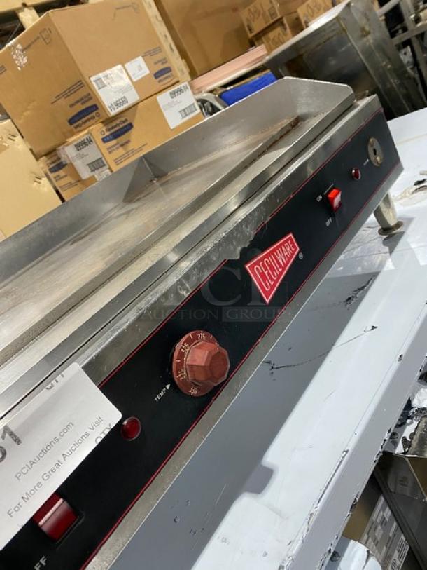 Cecilware EL1636 stainless steel electric countertop griddle, 36", thermostatic control, with back & side splash, on legs.