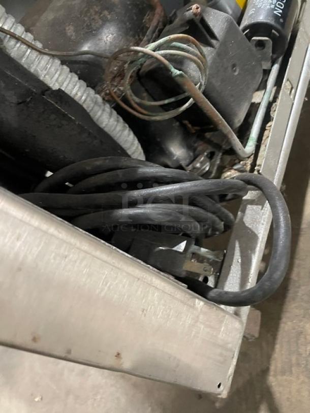 Fagor stainless steel undercounter fridge compressor area; model FUR-27, showing electrical wiring and components.