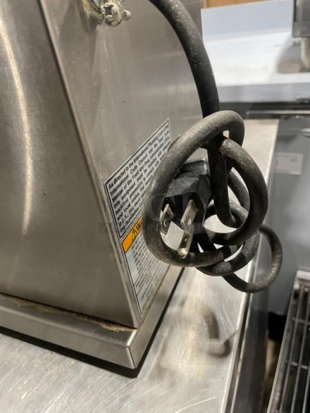 Bunn AXIOM Series Commercial Coffee Brewer, stainless steel with digital controls, hot water dispenser. Model AXIOM-DV-APS.