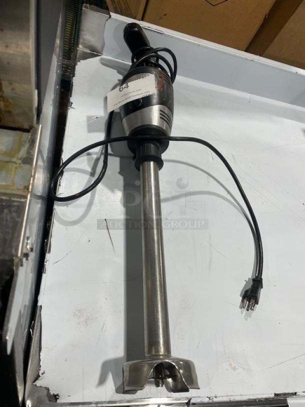 Waring Commercial Handheld Immersion Blender, Model WSB, 120V, stainless steel shaft, used condition, visible label tag.