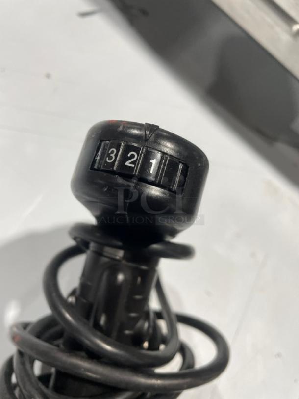 Waring Commercial Handheld Immersion Blender, Model WSB, 120V, speed dial visible, coiled cord, good condition.