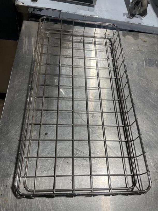 Commercial chrome-plated full-size bagel/pastry wired rack in excellent condition with durable metal grid design.