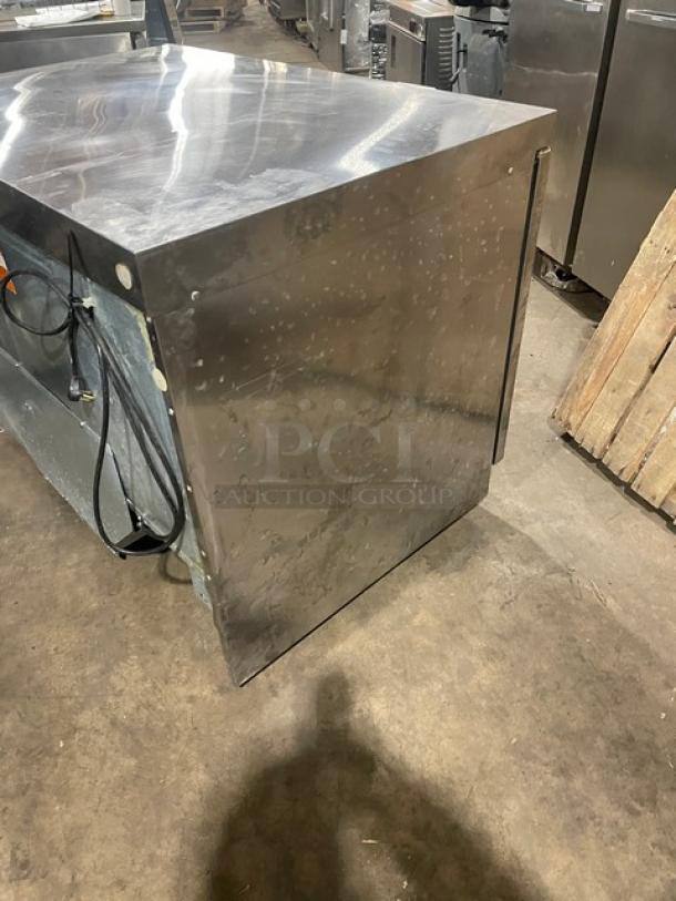 Delfield UC4448N-A8 stainless steel undercounter refrigerator, 2-door, poly-coated rack, on casters, 115V 1 phase.