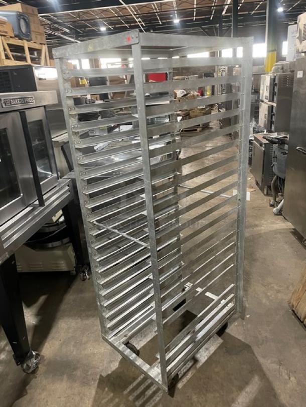Commercial aluminum sheet pan rack, holds 20 pans, end-load design, used condition, suitable for transport and storage.