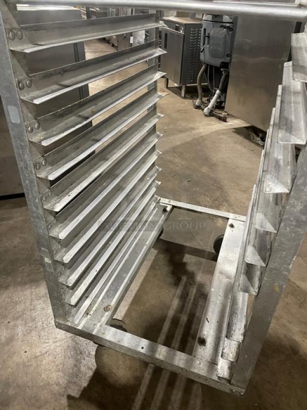 Commercial aluminum 20-pan end-load sheet pan holding/transport rack. Features durable metal construction and multiple slots.