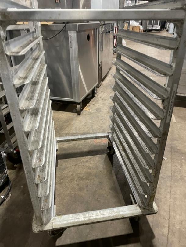 Commercial aluminum full-size heavy-duty bun/sheet pan rack on casters, featuring multiple slots, durable condition.